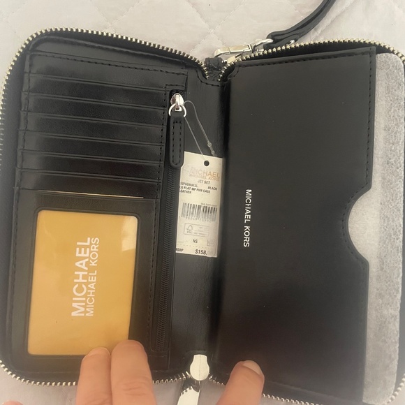 Jet Set Travel Large Pebbled Leather Wristlet - Picture 2 of 3